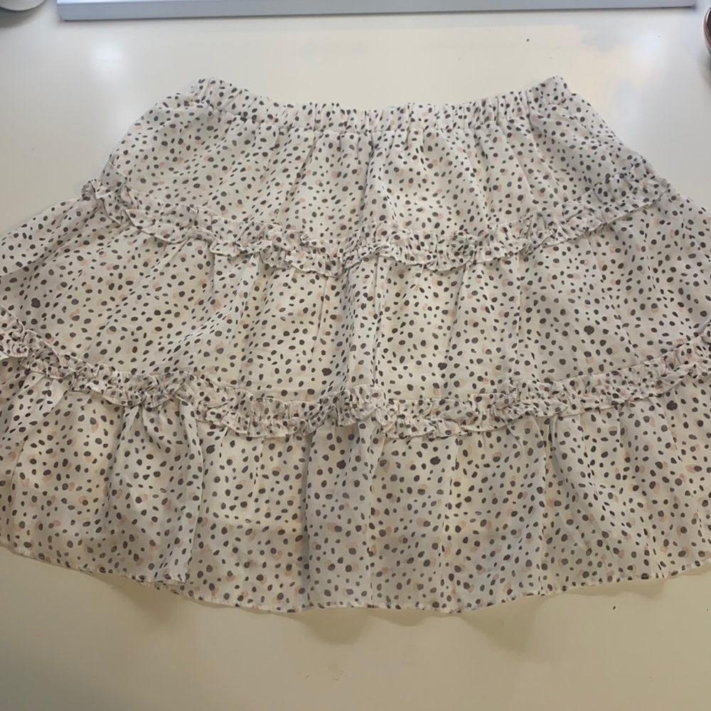 Ruffles dotted white mini skirt